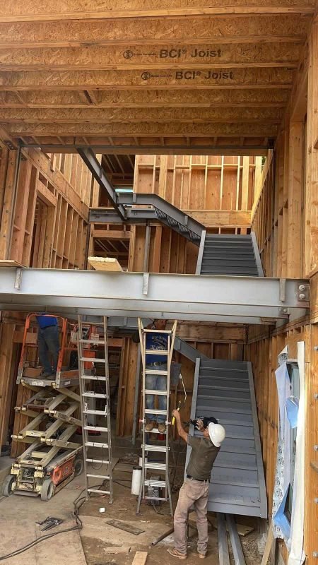 High-quality steel staircase framing under construction for a new home or commercial building.